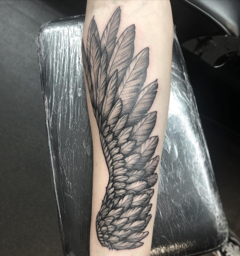 guardian angel feather tattoo meaning