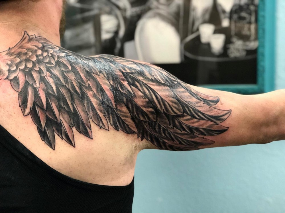 worm-angel-wing-tattoo-brickhouse_tattoos