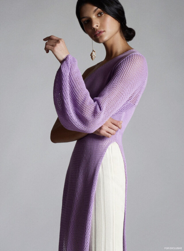 Abacaxi lavender asymmetrical tunic, Ajaie Alaie cream knit pants and SVNR shell earring. Photo: Willis Roberts
