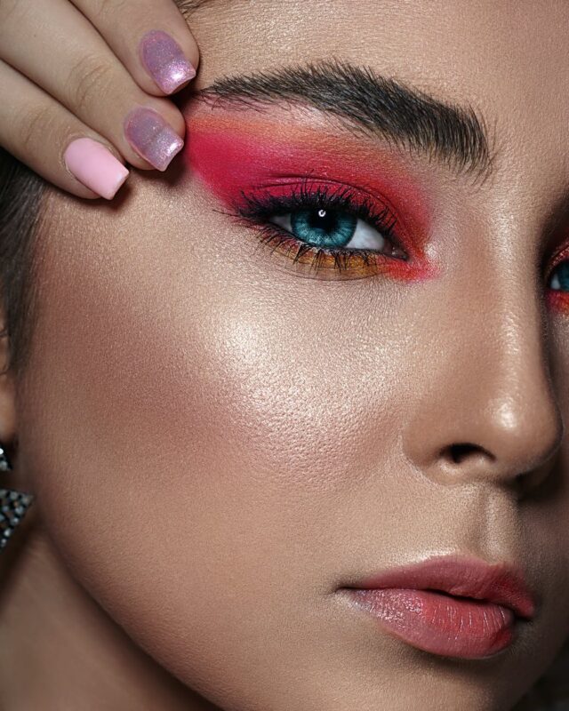 close up photo of woman with pink eyeshadow