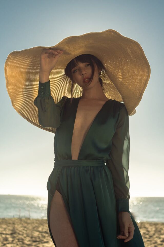 photo of woman wearing sun hat