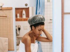 woman filling bath with water for cleaning procedure